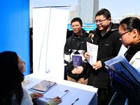 College graduates are attending a job fair in Qingdao, Shandong Province, China, on March 23, 2024. (