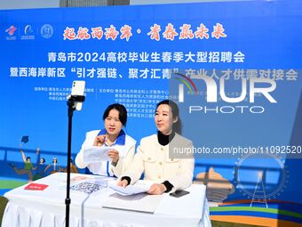 College graduates are attending a job fair in Qingdao, Shandong Province, China, on March 23, 2024. (