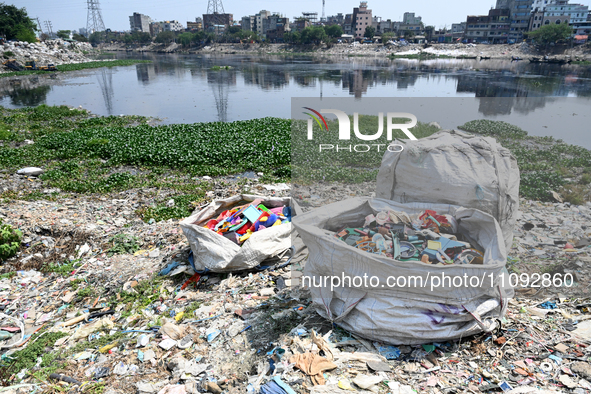 Plastic waste is floating in the polluted Buriganga River in Dhaka, Bangladesh, on March 23, 2024. Bangladesh is reportedly ranked 10th amon...