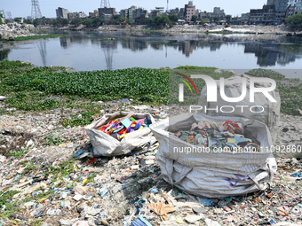 Plastic waste is floating in the polluted Buriganga River in Dhaka, Bangladesh, on March 23, 2024. Bangladesh is reportedly ranked 10th amon...