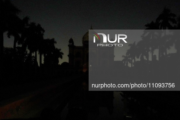 Safdarjung's Tomb is pictured with its lights turned off during the Earth Hour environmental campaign in New Delhi, India, on March 23, 2024...