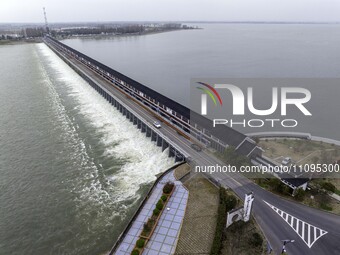 An aerial photo is showing the flood discharge from the 63-hole sluice of the Sanhe Gate of Hongze Lake in Huai'an, China, on March 24, 2024...