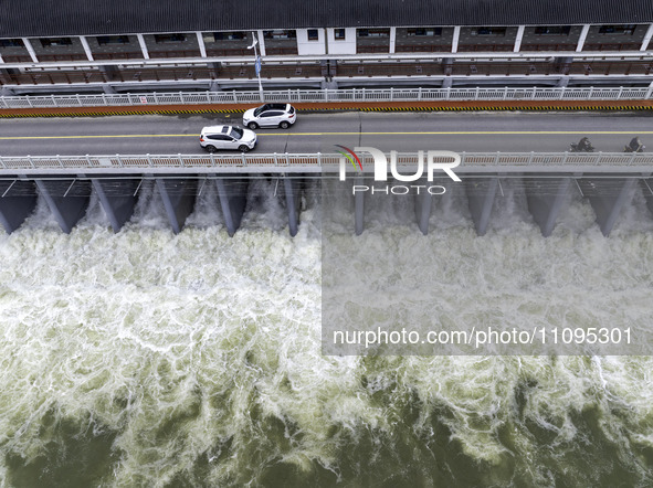 An aerial photo is showing the flood discharge from the 63-hole sluice of the Sanhe Gate of Hongze Lake in Huai'an, China, on March 24, 2024...