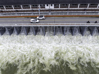 An aerial photo is showing the flood discharge from the 63-hole sluice of the Sanhe Gate of Hongze Lake in Huai'an, China, on March 24, 2024...