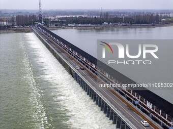 An aerial photo is showing the flood discharge from the 63-hole sluice of the Sanhe Gate of Hongze Lake in Huai'an, China, on March 24, 2024...