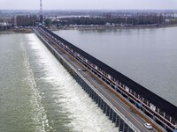 An aerial photo is showing the flood discharge from the 63-hole sluice of the Sanhe Gate of Hongze Lake in Huai'an, China, on March 24, 2024...