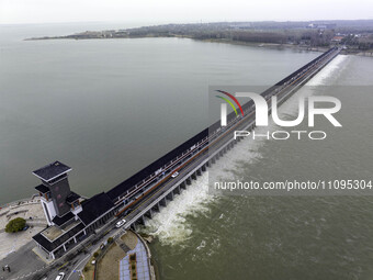 An aerial photo is showing the flood discharge from the 63-hole sluice of the Sanhe Gate of Hongze Lake in Huai'an, China, on March 24, 2024...