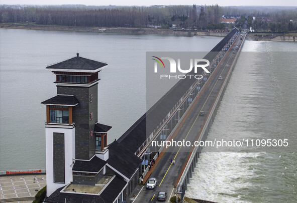 An aerial photo is showing the flood discharge from the 63-hole sluice of the Sanhe Gate of Hongze Lake in Huai'an, China, on March 24, 2024...