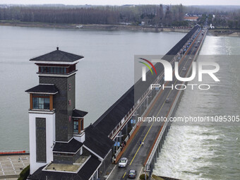 An aerial photo is showing the flood discharge from the 63-hole sluice of the Sanhe Gate of Hongze Lake in Huai'an, China, on March 24, 2024...