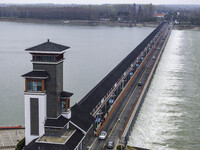 An aerial photo is showing the flood discharge from the 63-hole sluice of the Sanhe Gate of Hongze Lake in Huai'an, China, on March 24, 2024...