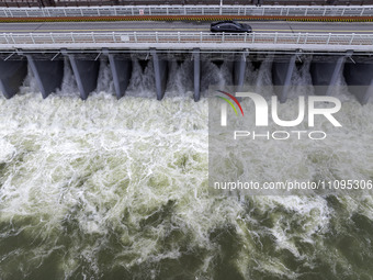 An aerial photo is showing the flood discharge from the 63-hole sluice of the Sanhe Gate of Hongze Lake in Huai'an, China, on March 24, 2024...