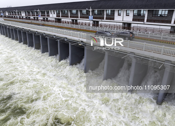 An aerial photo is showing the flood discharge from the 63-hole sluice of the Sanhe Gate of Hongze Lake in Huai'an, China, on March 24, 2024...