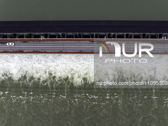 An aerial photo is showing the flood discharge from the 63-hole sluice of the Sanhe Gate of Hongze Lake in Huai'an, China, on March 24, 2024...