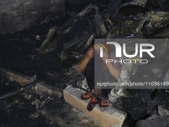 A fire is breaking out in a slum on T&T Boys School Road in Mohakhali, Dhaka, around 4:15. (