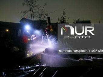 A fire is breaking out in a slum on T&T Boys School Road in Mohakhali, Dhaka, around 4:15. (