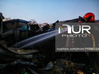 A fire is breaking out in a slum on T&T Boys School Road in Mohakhali, Dhaka, around 4:15. (