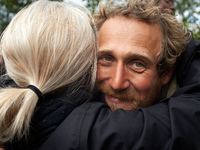 Reva, one of the three 'Ecureuils', is being hugged by a friend. After 37 days in the trees, the last three 'Ecureuils' living in the ZAD (Z...