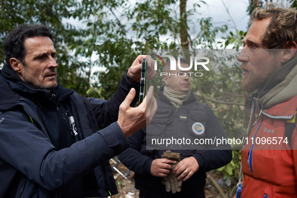 Thomas Brail, the founder of the GNSA, is filming with his smartphone Reva, one of the three 'Ecureuils', in Saix, France, on March 24, 2024...