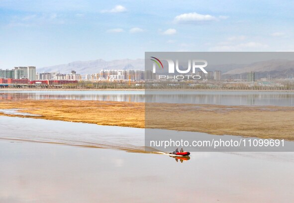 An aerial photo is showing the scenery of Wuhai Lake in Wuhai City, Inner Mongolia Autonomous Region, North China, on March 26, 2024. 