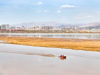 An aerial photo is showing the scenery of Wuhai Lake in Wuhai City, Inner Mongolia Autonomous Region, North China, on March 26, 2024. (