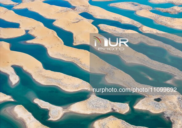 An aerial photo is showing the scenery of Wuhai Lake in Wuhai City, Inner Mongolia Autonomous Region, North China, on March 26, 2024. 