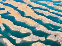 An aerial photo is showing the scenery of Wuhai Lake in Wuhai City, Inner Mongolia Autonomous Region, North China, on March 26, 2024. (