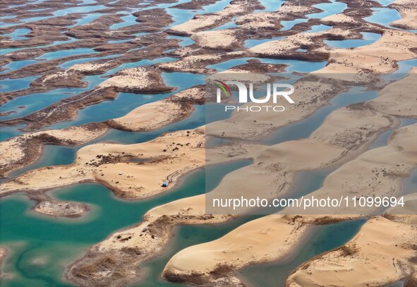 An aerial photo is showing the scenery of Wuhai Lake in Wuhai City, Inner Mongolia Autonomous Region, North China, on March 26, 2024. 