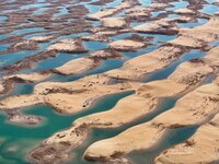 An aerial photo is showing the scenery of Wuhai Lake in Wuhai City, Inner Mongolia Autonomous Region, North China, on March 26, 2024. (