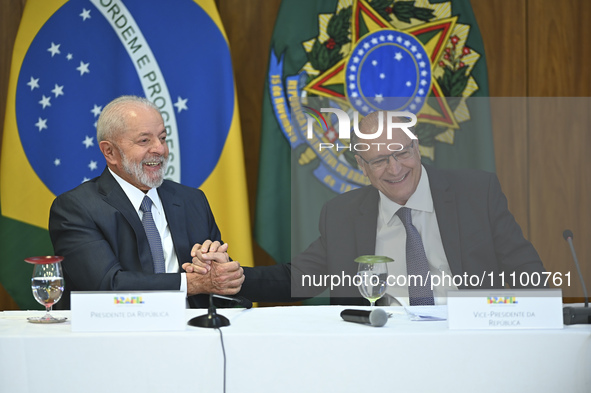 Brazil's President Luiz Inacio Lula da Silva, along with Vice President Geraldo Alckmin, is participating in a ceremony at the Planalto Pala...