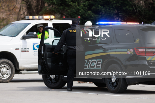 Maryland Transportation Authority Police work alongside Maryland Department of Transportation officials to deliver supplies to emergency off...