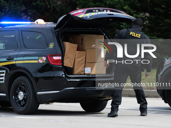 Maryland Transportation Authority Police work alongside Maryland Department of Transportation officials to deliver supplies to emergency off...