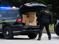 Maryland Transportation Authority Police work alongside Maryland Department of Transportation officials to deliver supplies to emergency off...