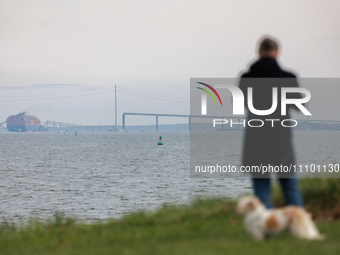 People view the collapsed Francis Scott Key Bridge in Baltimore, Maryland from the Fort McHenry National Monument and Historic Shrine on Mar...