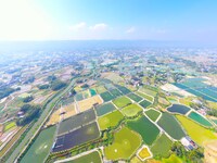 An aerial photo is showing fish ponds nestled between villages, fields, and rivers in Chongqing, China, on March 28, 2024. (