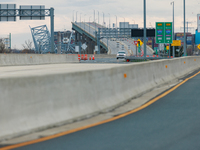 The collapsed Francis Scott Key Bridge is seen from a media staging area at the Maryland Tansportation Authority headquarters in Dundalk, Ma...