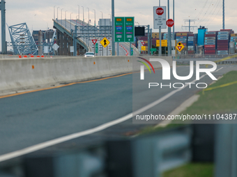 The collapsed Francis Scott Key Bridge is seen from a media staging area at the Maryland Tansportation Authority headquarters in Dundalk, Ma...