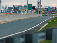 The collapsed Francis Scott Key Bridge is seen from a media staging area at the Maryland Tansportation Authority headquarters in Dundalk, Ma...