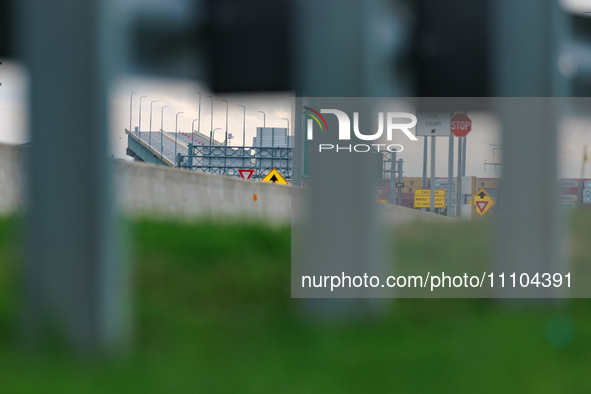 The collapsed Francis Scott Key Bridge is seen from a media staging area at the Maryland Tansportation Authority headquarters in Dundalk, Ma...