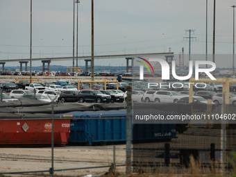 The collapsed Francis Scott Key Bridge is seen beyond the Dundalk Marine Terminal in Dundalk, Maryland on March 28, 2024. (