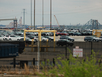 The collapsed Francis Scott Key Bridge is seen beyond the Dundalk Marine Terminal in Dundalk, Maryland on March 28, 2024. (