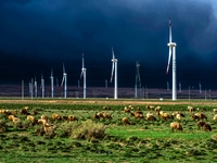 Wind power facilities are being seen in Xinjiang, China, on May 1, 2017. Xinjiang is integrating wind, solar, hydro, biomass, geothermal, an...