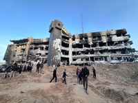Palestinians are inspecting the damage at Gaza's Al-Shifa hospital after the Israeli military withdrew from the complex housing the hospital...