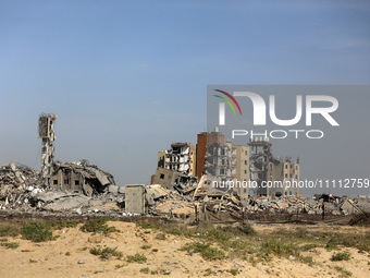 A damaged building in the Asra residential compound, northwest of Nuseirat, is shown in the Gaza Strip, on April 1, 2024, amid the ongoing c...