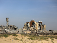 A damaged building in the Asra residential compound, northwest of Nuseirat, is shown in the Gaza Strip, on April 1, 2024, amid the ongoing c...