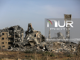 A damaged building in the Asra residential compound, northwest of Nuseirat, is shown in this photo taken in the Gaza Strip on April 1, 2024,...