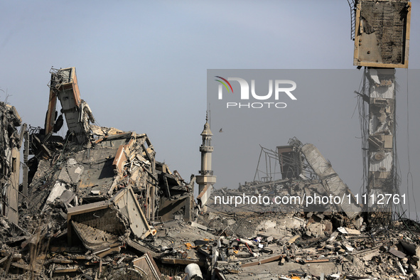 A damaged building in the Asra residential compound, northwest of Nuseirat, is shown in this photo taken in the Gaza Strip on April 1, 2024,...