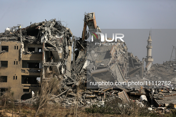 A damaged building in the Asra residential compound, northwest of Nuseirat, is shown in this photo taken in the Gaza Strip on April 1, 2024,...