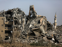 A damaged building in the Asra residential compound, northwest of Nuseirat, is shown in this photo taken in the Gaza Strip on April 1, 2024,...