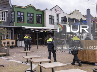 The hostage situation at the Petticoat cafe in Ede, Gelderland, Netherlands, is ending peacefully with the arrest of a suspect. A 28-year-ol...