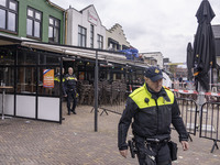 The hostage situation at the Petticoat cafe in Ede, Gelderland, Netherlands, is ending peacefully with the arrest of a suspect. A 28-year-ol...